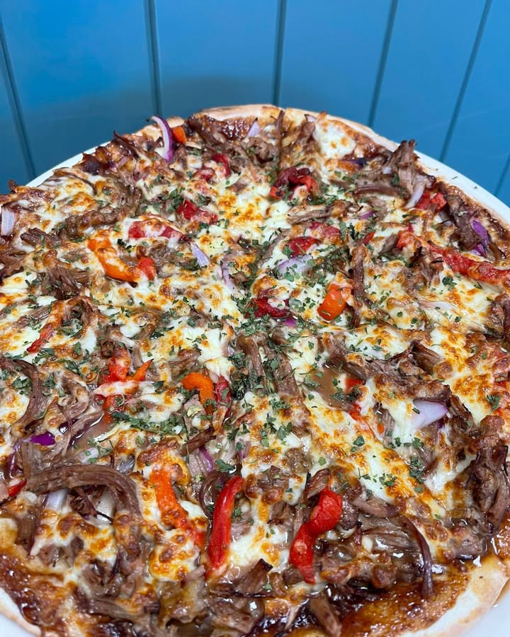 Featured image for “Pulled Beef Pizza $25 at Testa Rossa Club Redhead”