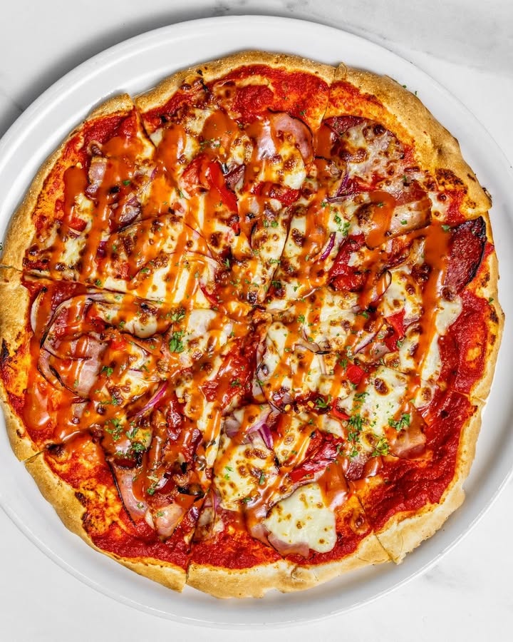 Featured image for “Craving Pizza? Visit Testa Rossa at Club Redhead”
